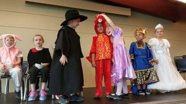 the king does not look thrilled at the prospect of having a pet dragon in his castle